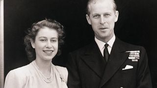 (Original Caption) 7/11/1947-London, England- Princess Elizabeth, Britain's future queen, and Lt. Philip Mountbatten shown at Buckingham Palace. On her engagement finger, the Princess wears a three-diamond ring, symbolic of her bethrotal. Photo was made July 10th when the royal lovers made their first public appearance following announcement of their engagement by King George.