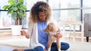 Woman training puppy