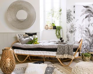Reading nook with futon and room divider by Maisons du Monde