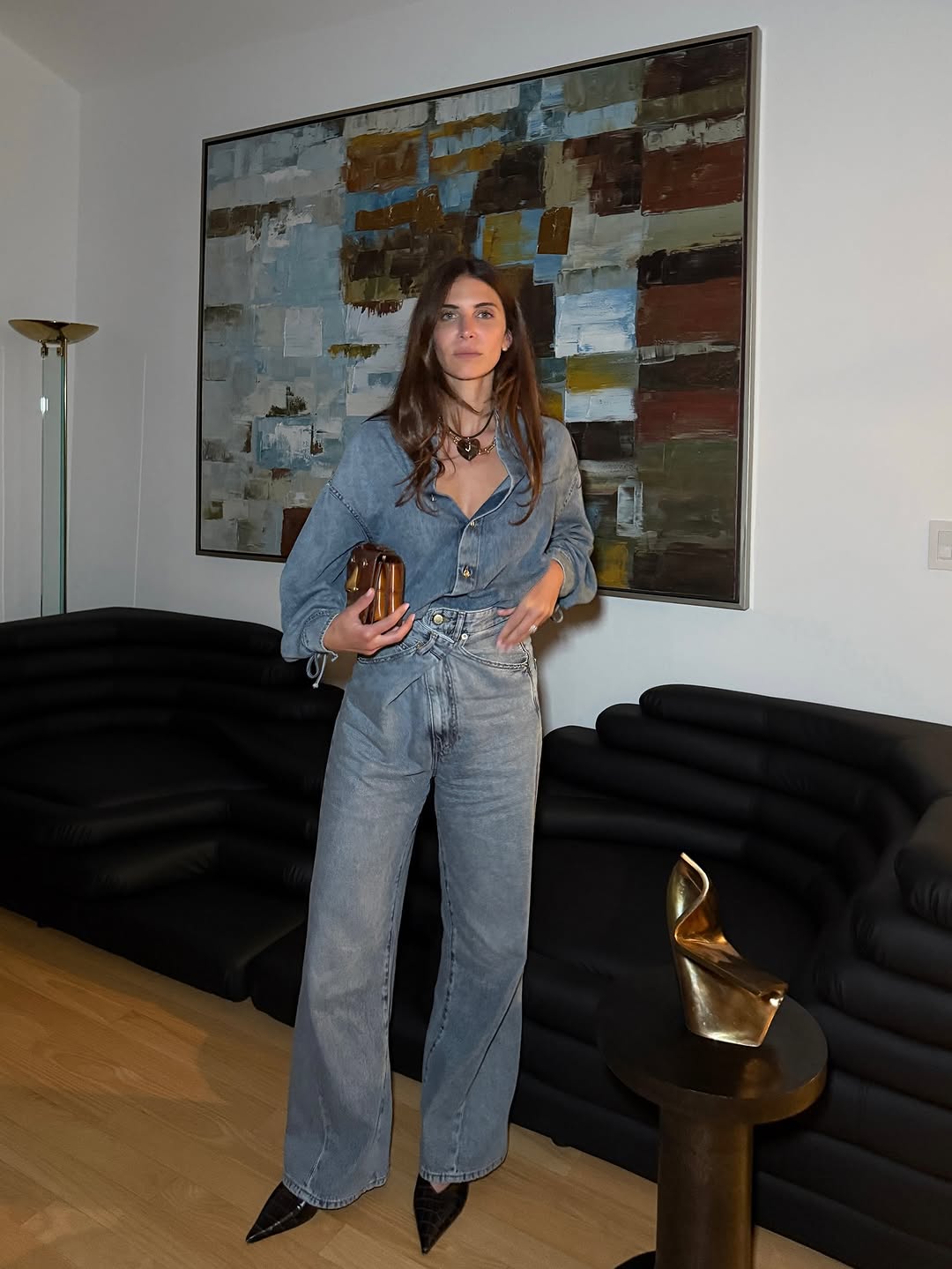 woman wearing black pointed toe heels jeans fall outfits 2025