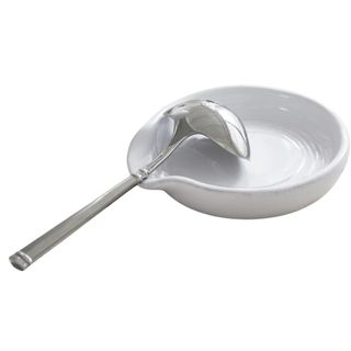 White circular spoon rest