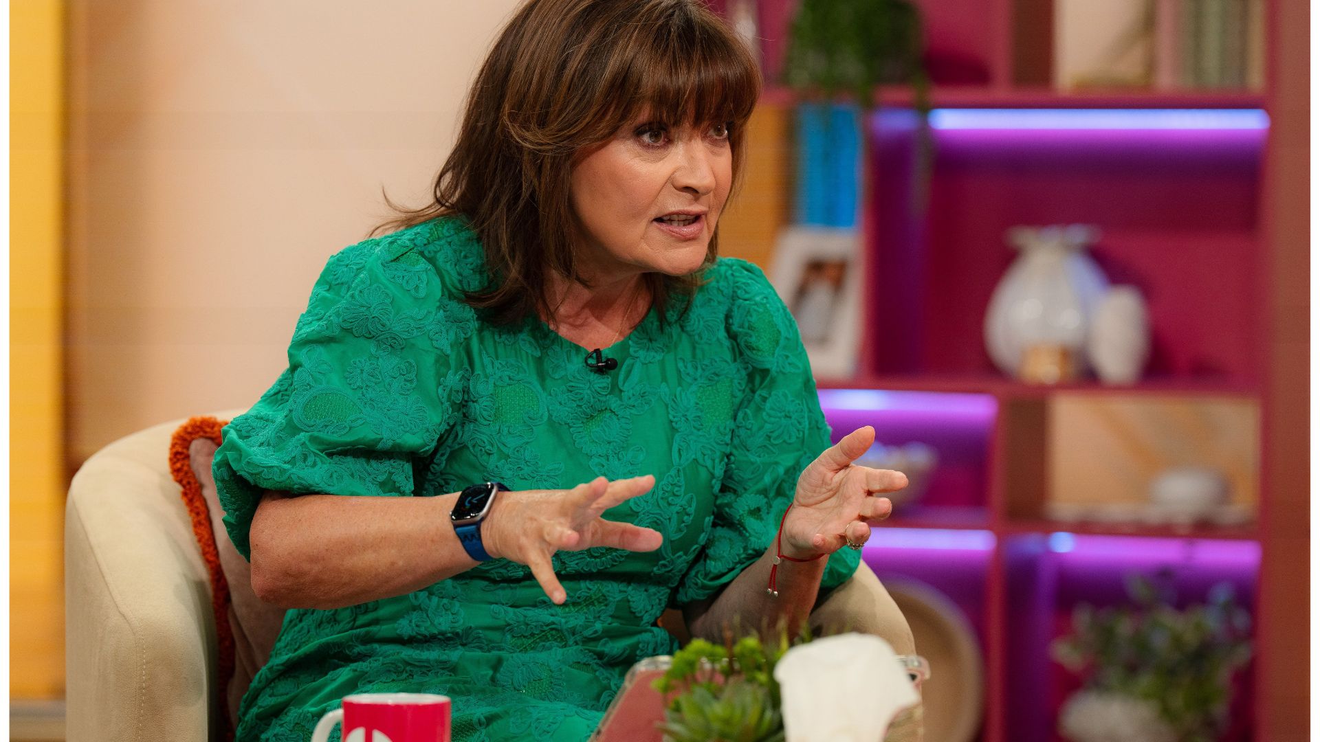 lorraine kelly wearing a green dress