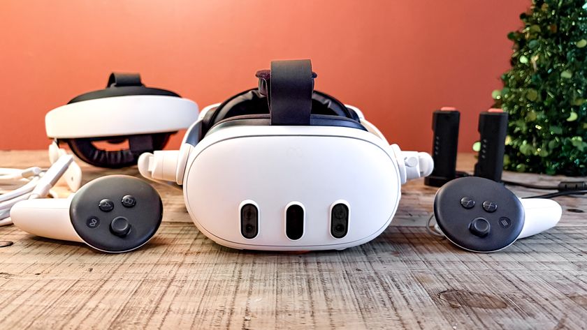 Meta Quest 3 with VR accessories on table 