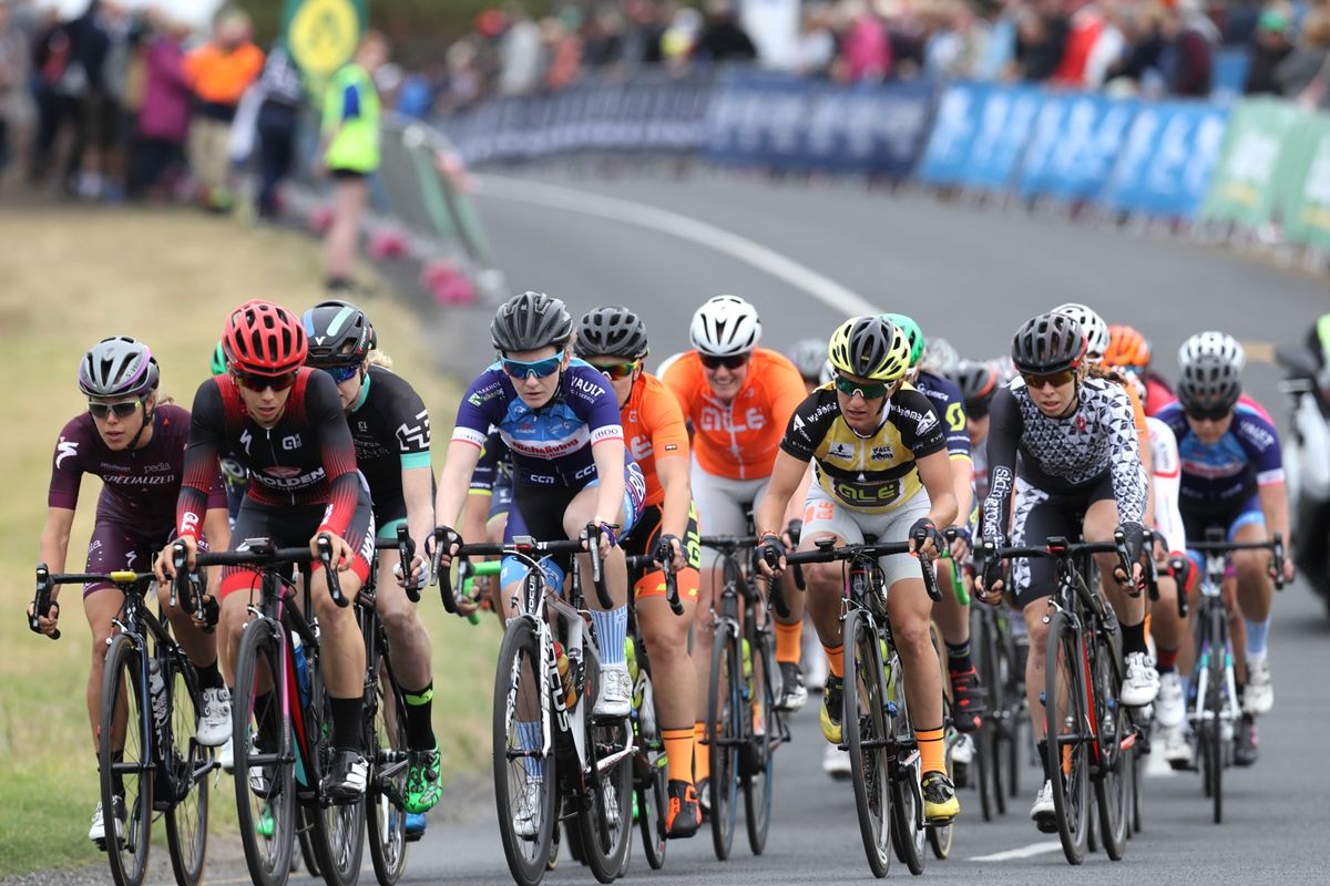 The peloton spreads itself across the road