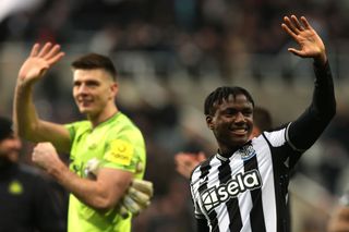 Michael Ndiweni of Newcastle United acknowledges the fans following the team's victory during the Premier League match between Newcastle United and Chelsea FC at St. James Park on November 25, 2023 in Newcastle upon Tyne, England
