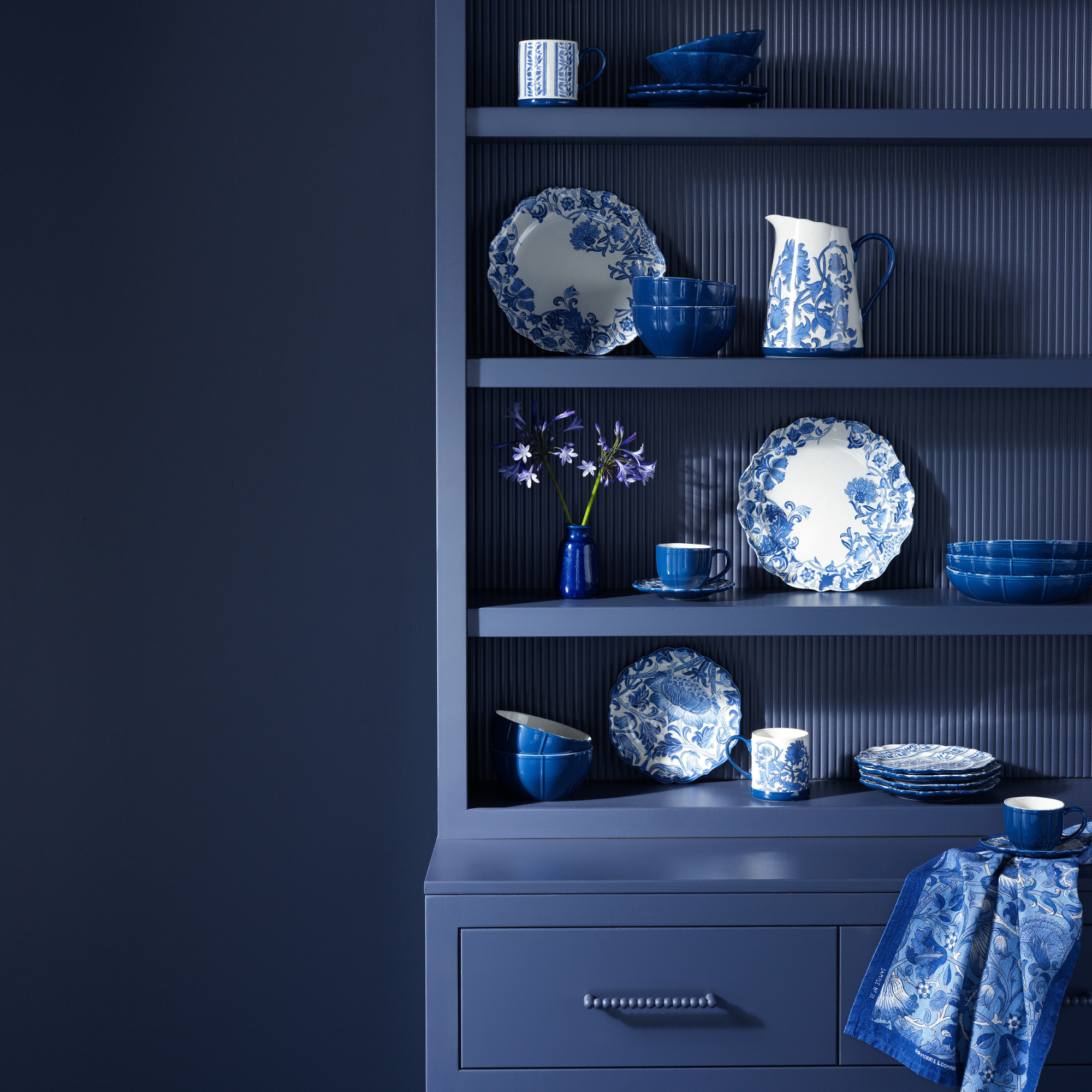 Habitat x Morris &amp; Co kitchenware on blue chest of drawers.