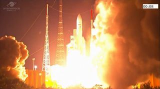 An Arianespace Ariane 5 rocket launches into orbit with three satellites, the Mission Extension Vehicle 2 and Galaxy 30 communications satellite (both for Intelsat) and the BSAT-4b communications satellite for Japan's Broadcasting Satellite System Corporation.