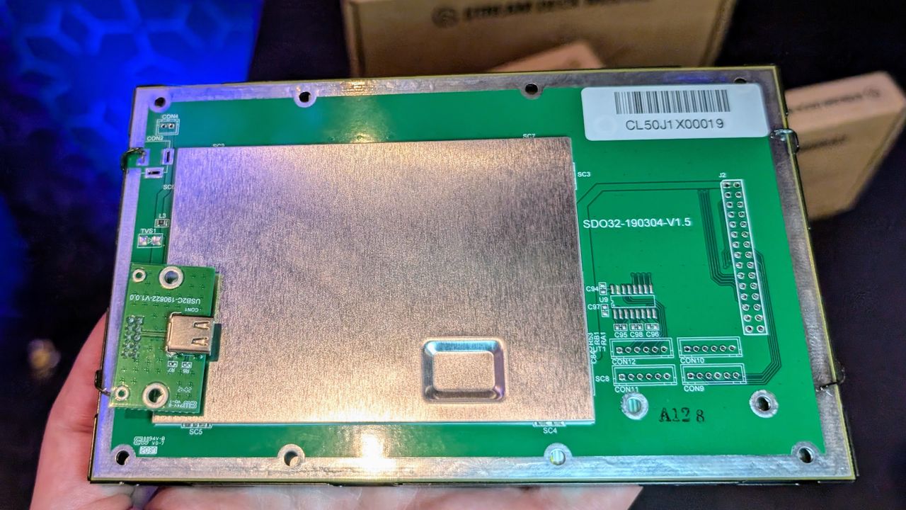 Stream Deck 8x4 modular unit showing rear side held in a hand at Computex 2025 Computex 2025