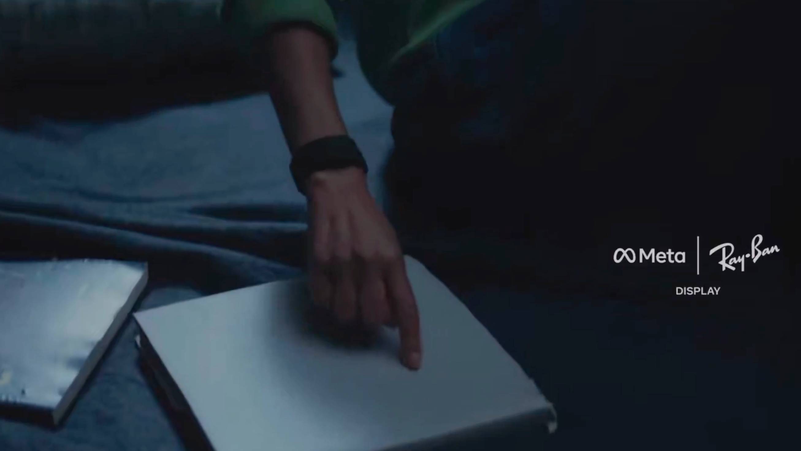Person with Ray-Ban Meta Display Wristband in screenshot of leaked ad