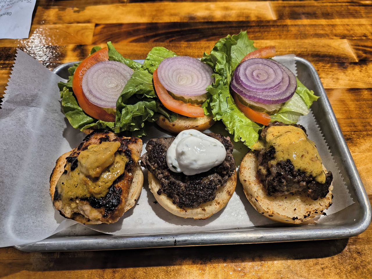 Three small burgers