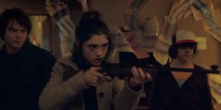 Nancy with a rifle in Season 2