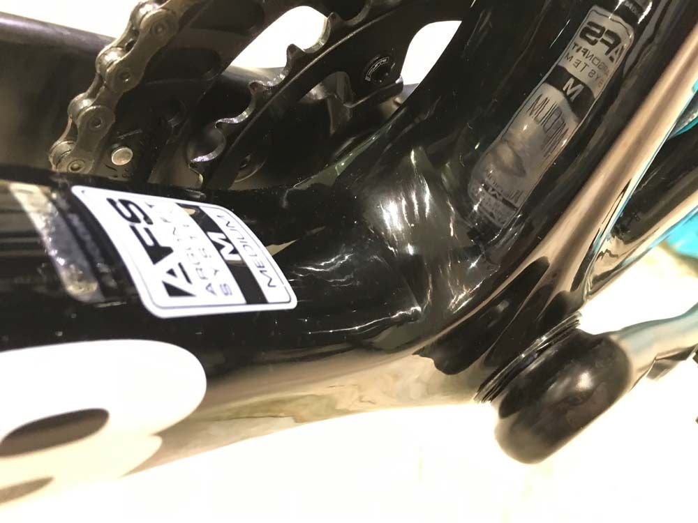 The bottom bracket is solid and reflective