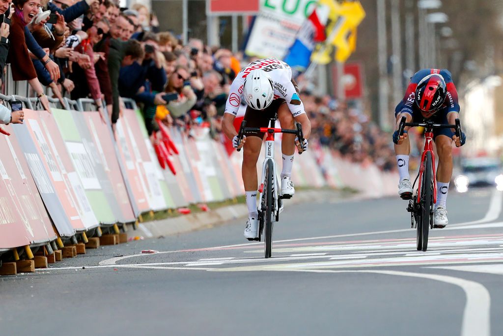 VALKENBURG NETHERLANDS APRIL 10 LR Benoit Cosnefroy of France and AG2R Citren Team and Michal Kwiatkowski of Poland and Team INEOS Grenadiers sprint to win during the 56th Amstel Gold Race 2022 Mens Elite a 2541km one day race from Maastricht to Valkenburg AGR2022 WorldTour on April 10 2022 in Valkenburg Netherlands Photo by Bas CzerwinskiGetty Images