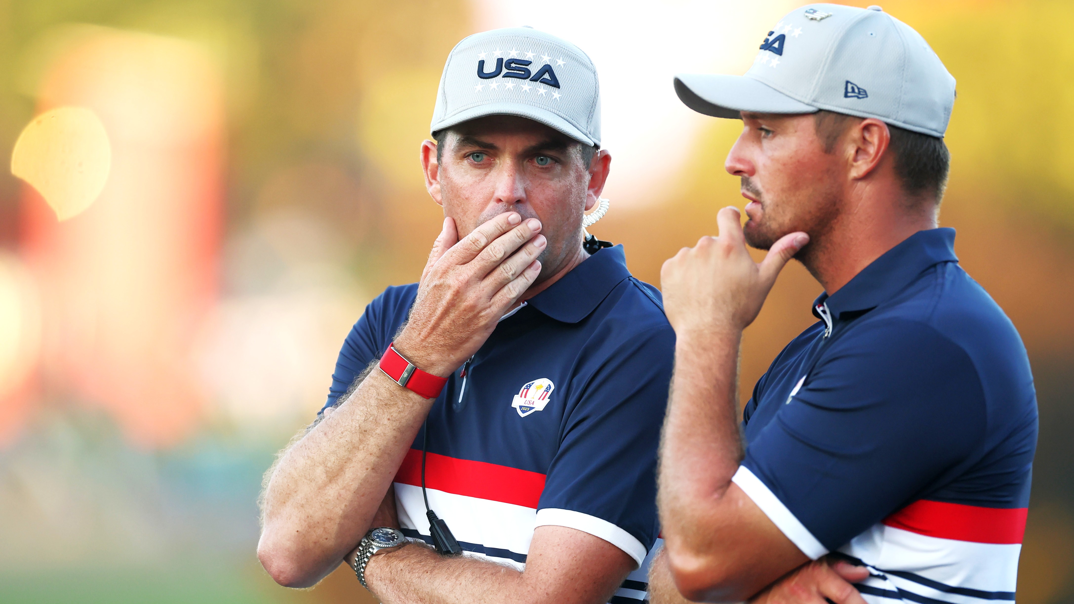 Keegan Bradley with Bryson DeChambeau by the 18th green during the Friday afternoon four-ball matches of the 2025 Ryder Cup