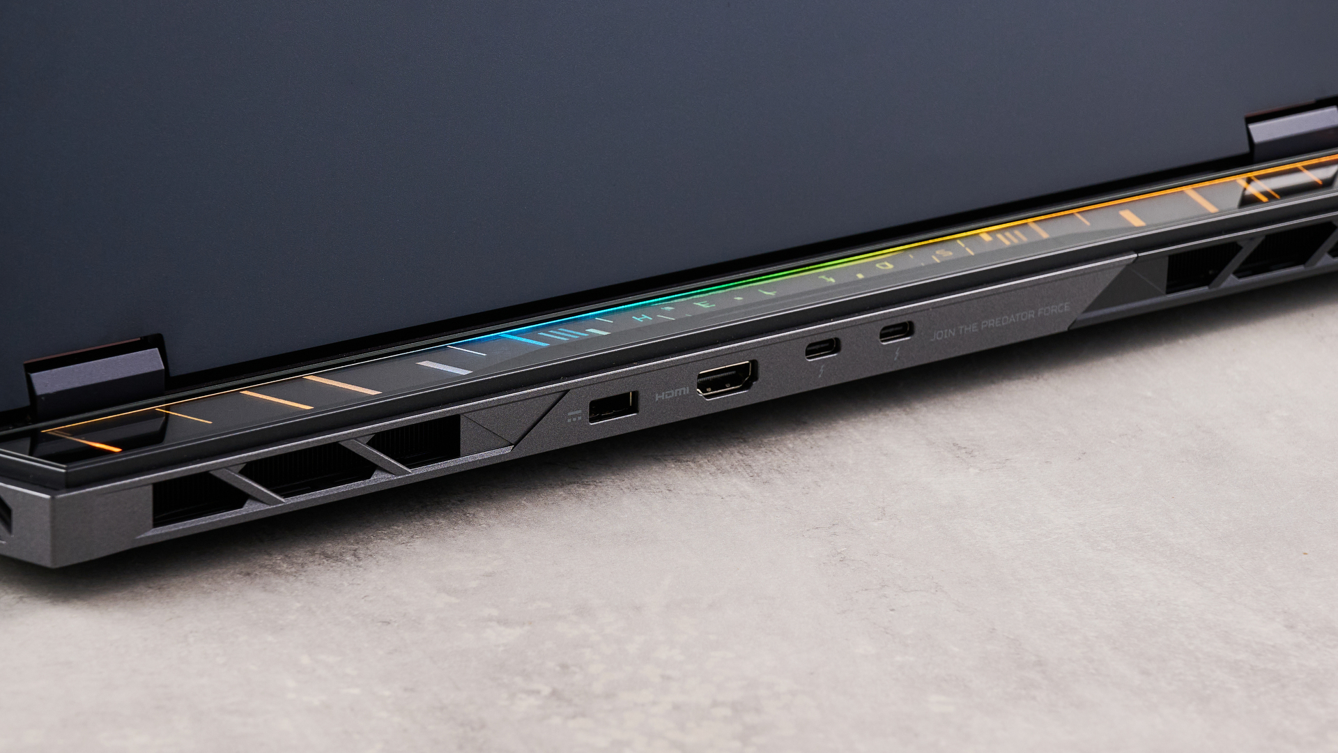 Close-up of rear ports on Acer Predator Helios 18 AI open on desk