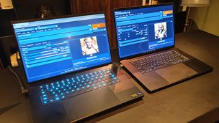 Nvidia RTX vs M3 Max; two laptops on a wooden table
