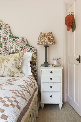 bedroom with pink ground walls