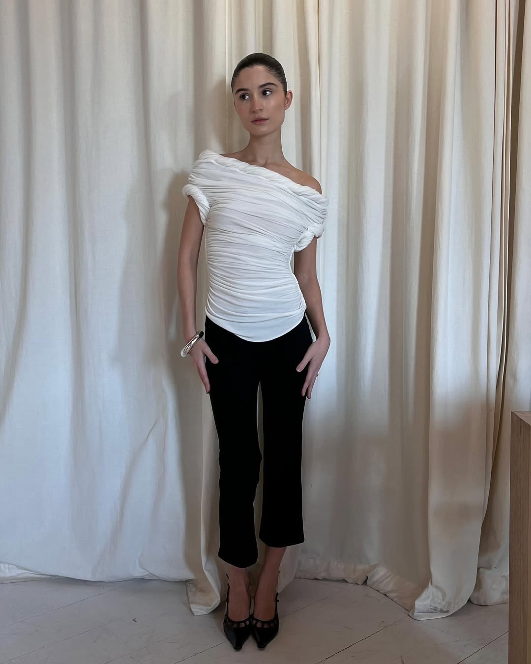 Andrea Ricci wearing Orseund Iris Capri pants