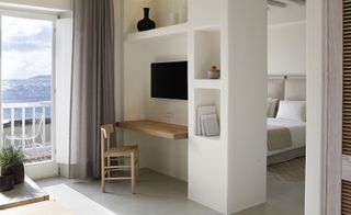 White/light walls and linen with light wooden woods used for soft contrast