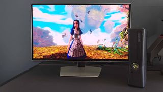 Xbox 360 connected to Samsung Odyssey G6 using mClassic HDMI upscaler running Alice: Madness Returns with main character facing camera.