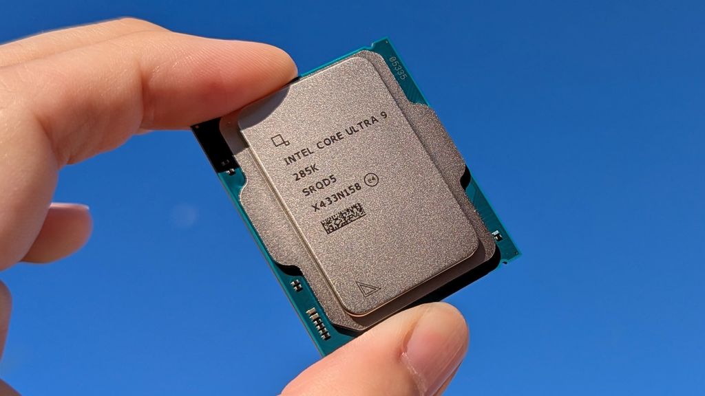 Intel Core Ultra 9 285K processor held in front of a blue sky