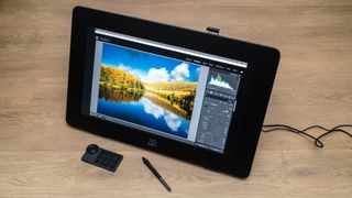 XPen Artist Pro 24 (Gen 2) 4K drawing tablet on a wooden surface