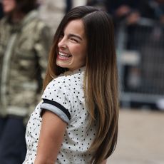 Addison Rae is photographed at the Miu Miu show