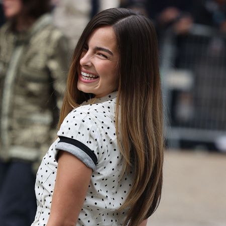 Addison Rae is photographed at the Miu Miu show