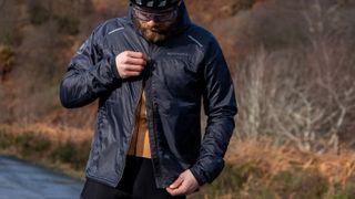 Endura GV500 Insulated jacket being unzipped from the bottom