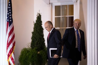 Andrew Puzder departs after a meeting with Donald Trump