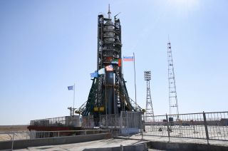 The United Arab Emirates (UAE) flag, second from right, flies with other nations' banners in front of the Soyuz FG rocket that will lift off with the first UAE astronaut, Hazzaa Ali Almansoori, at Gagarin's Start at the Baikonur Cosmodrome in Kazakhstan on Monday, Sept. 23, 2019.