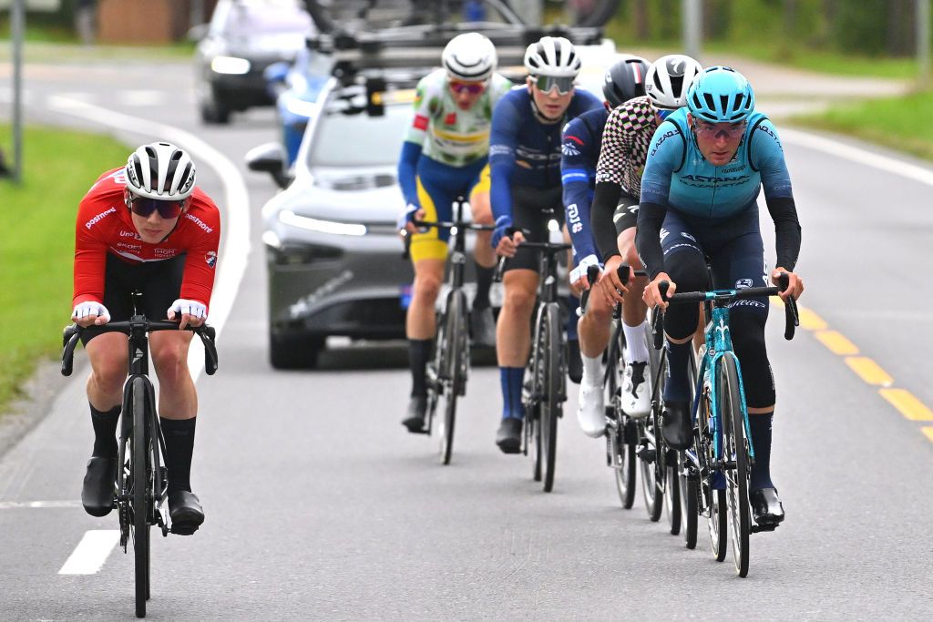 HAMMERFEST NORWAY AUGUST 18 LR Peder Antoni Gravs of Norway and Team Norway and Gianmarco Garofoli of Italy and Astana Qazaqstan Team compete in the breakaway during the 10th Arctic Race of Norway Stage 2 a 1534km stage from Alta to Hammerfest on August 18 2023 in Hammerfest Norway Photo by Luc ClaessenGetty Images