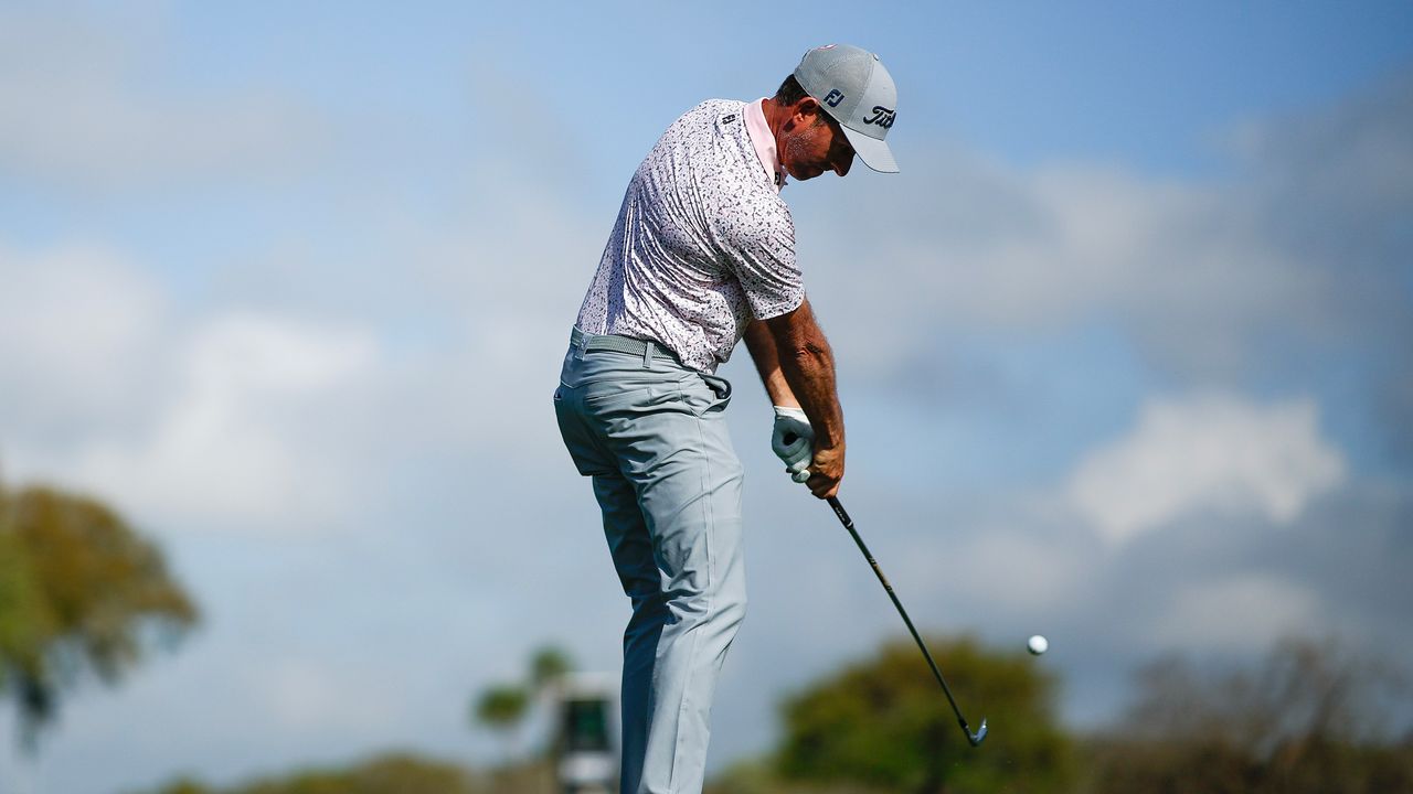 Webb Simpson hits an iron shot at the 2024 Arnold Palmer Invitational