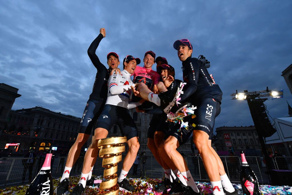 MILANO ITALY OCTOBER 25 Podium Tao Geoghegan Hart of The United Kingdom Jonathan Castroviejo of Spain Rohan Dennis of Australia Filippo Ganna of Italy Salvatore Puccio of Italy Ben Swift of The United Kingdom Team INEOS Grenadiers Trofeo Senza Fine Trophy Celebration during the 103rd Giro dItalia 2020 Stage 21 a 157km Individual time trial from Cernusco sul Naviglio to Milano ITT girodiitalia Giro on October 25 2020 in Milano Italy Photo by Stuart FranklinGetty Images