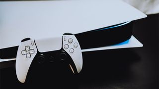 A PS5 console and controller 