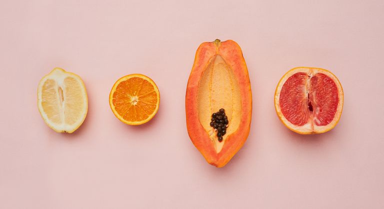 A row of soft fruit on a pink background