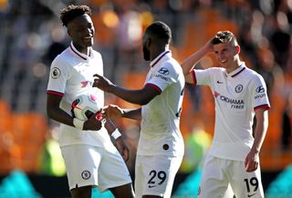 Tammy Abraham (left), Fikayo Tomori and Mason Mount (right) have been mainstays in the Chelsea team this season