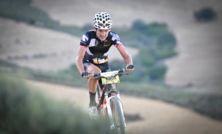 Max Knox grimaces as he claims the King of the Mountains