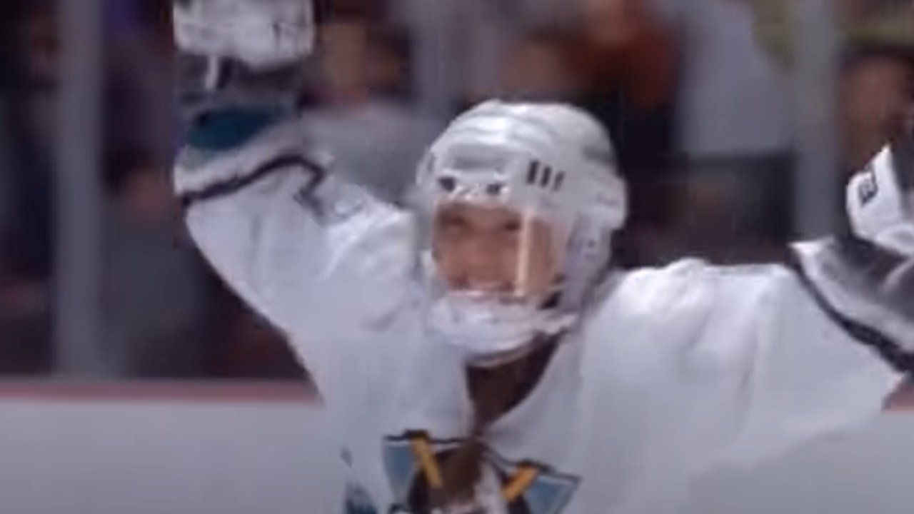 Connie celebrates a goal in her Ducks sweater.