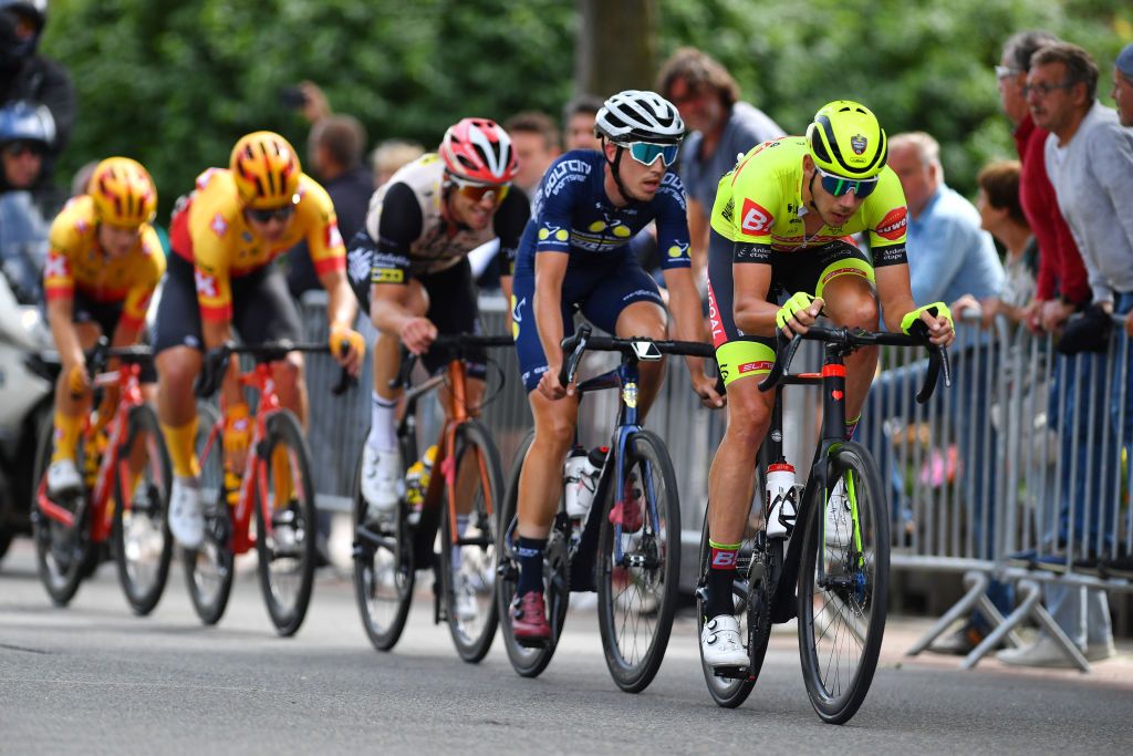 BERINGEN BELGIUM JUNE 19 Ludovic Robeet of Belgium and Team Bingoal Pauwels Sauces Wb Angelo Van Den Bossche of Belgium and Team Geofco Doltcini MaterielVeloCom Kobe Vanoverschelde of Belgium and Team Tarteletto Isorex Martin Bugge Urianstad of Norway and Uno X Pro Cycling Team and Jonas Abrahamsen of Norway and Uno X Pro Cycling Team compete in the breakaway during the 91st Baloise Belgium Tour 2022 Stage 5 a 1799km stage from Gingelom to Beringen BaloiseBelgiumTour on June 19 2022 in Beringen Belgium Photo by Luc ClaessenGetty Images