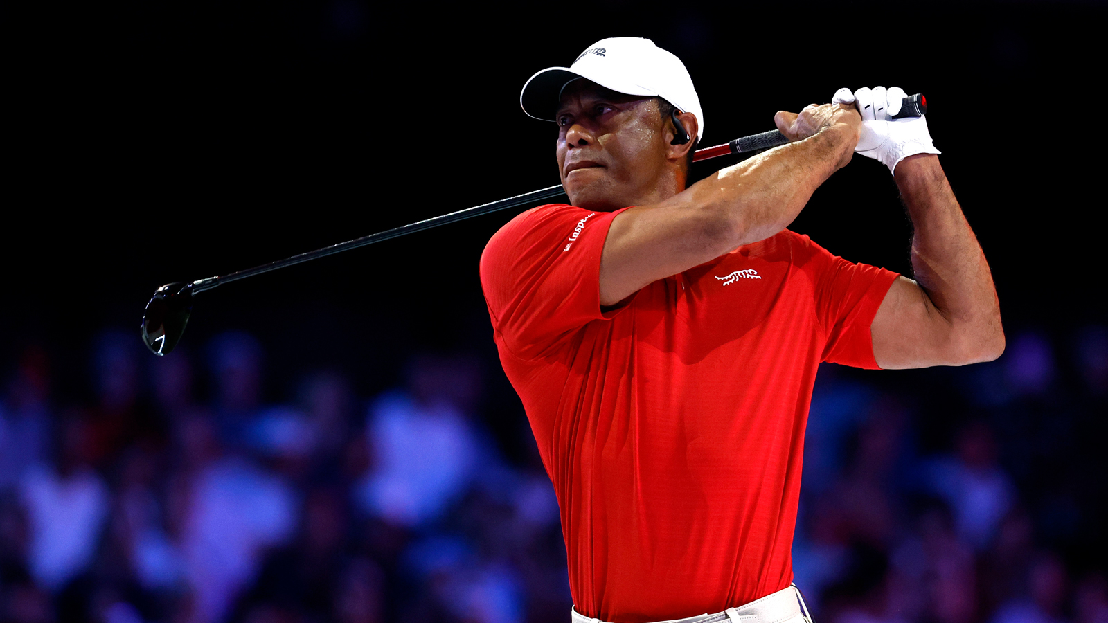 Tiger Woods plays a shot on the ninth hole during the match against the Los Angeles Golf Club at SoFi Center