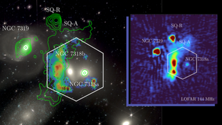 Glowing orbs against a black background with a white hexagon indicating the site of colliding galaxies