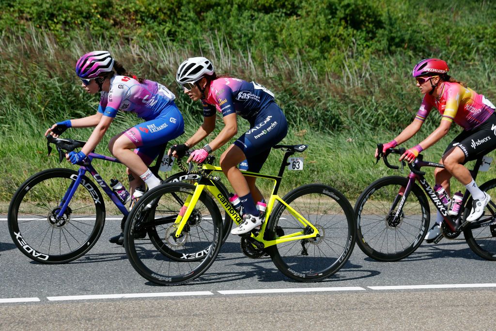 LELYSTAD NETHERLANDS AUGUST 30 LR Ruby RosemanGannon of Australia and Team BikeExchange Jayco Eleonora Camilla Gasparrini of Italy and Team Valcar Travel Service and Chantal Van Den Broek Blaak of Netherlands and Team SD Worx compete during the 25th Simac Ladies Tour 2022 Stage 1 a 1412km stage from Lelystad to Lelystad SLT2022 UCIWWT on August 30 2022 in Lelystad Netherlands Photo by Bas CzerwinskiGetty Images
