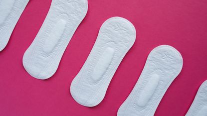 period pads on a pink background