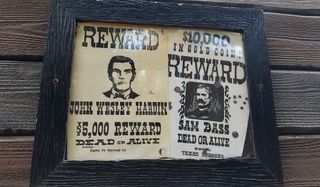 Wanted Posters behind Big Thunder Mountain Railroad