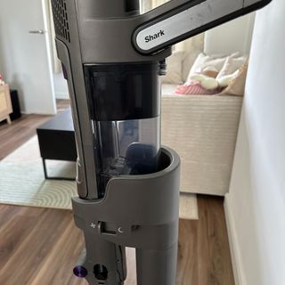 Shark PowerDetect Clean and Empty Cordless Vacuum testing the emptying process