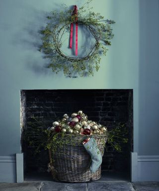 christmas bauble display with fireplace and basket