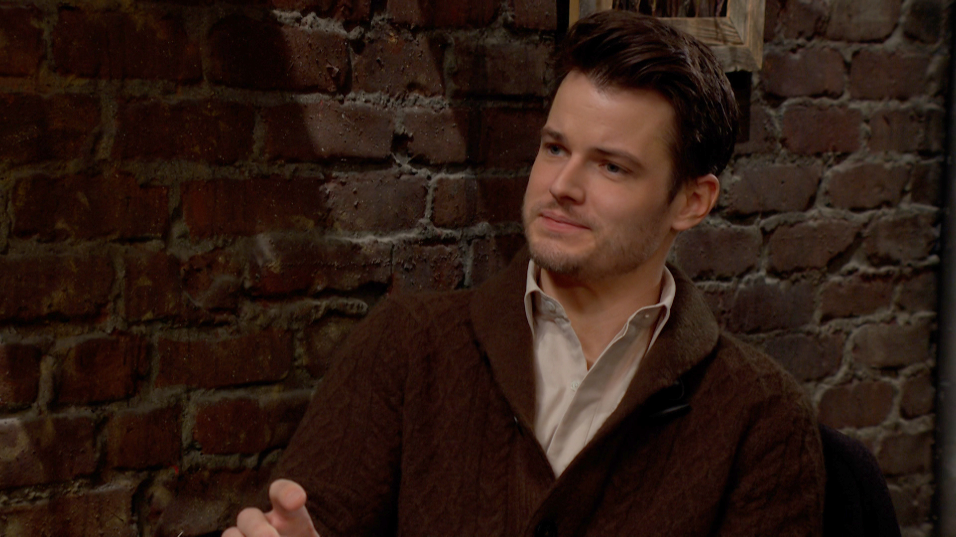 Michael Mealor as Kyle smirking in The Young and the Restless