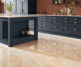 navy kitchen with modern shaker units and large format glossy floor tiles