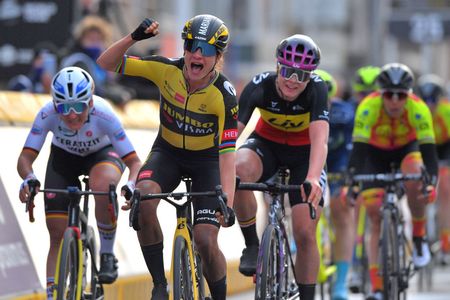 WEVELGEM BELGIUM MARCH 28 Arrival Marianne Vos of Netherlands and Team Jumbo Visma Celebration Lisa Brennauer of Germany and Ceratizit WNT Pro Cycling Team Lotte Kopecky of Belgium and Team Liv Racing during the 10th GentWevelgem In Flanders Fields 2021 Womens Elite a 1417km race from Ypres to Wevelgem GWE21 GWEWomen FlandersClassic UCIWWT on March 28 2021 in Wevelgem Belgium Photo by Luc ClaessenGetty Images